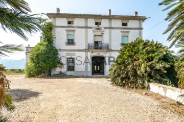 Casa amb parcel·la 12 habitacions